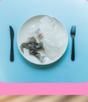 Microplastic debris beside tableware