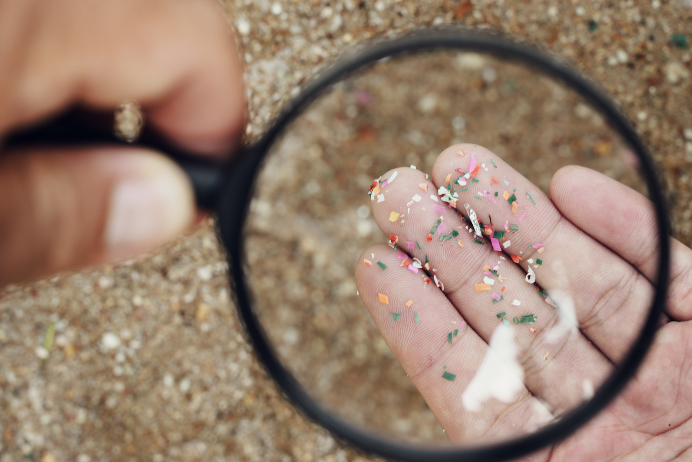Microplastics viewed through a magnifying glass
